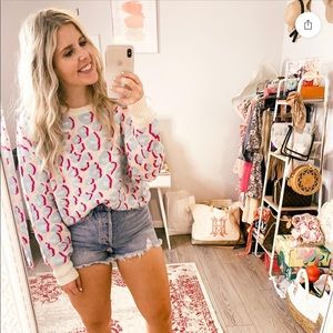 Pink lily leopard sweater